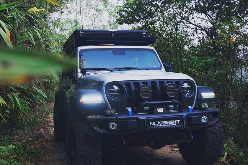 Novsight's car traveling through the jungle