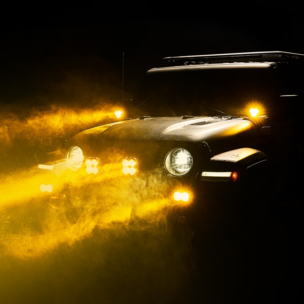 Showing NOVSIGH halo series spotlight mounted on car