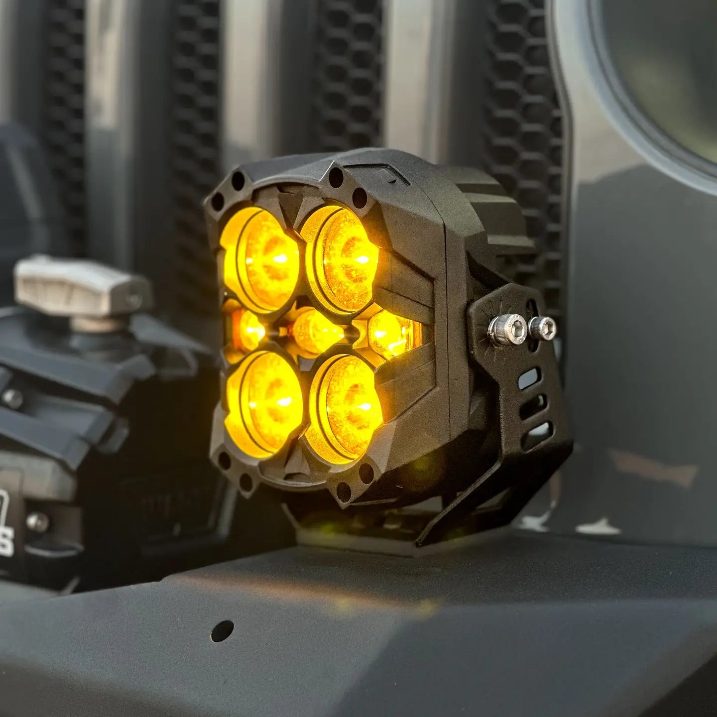 6 inch LED light pods on a vehicle with glowing yellow lights