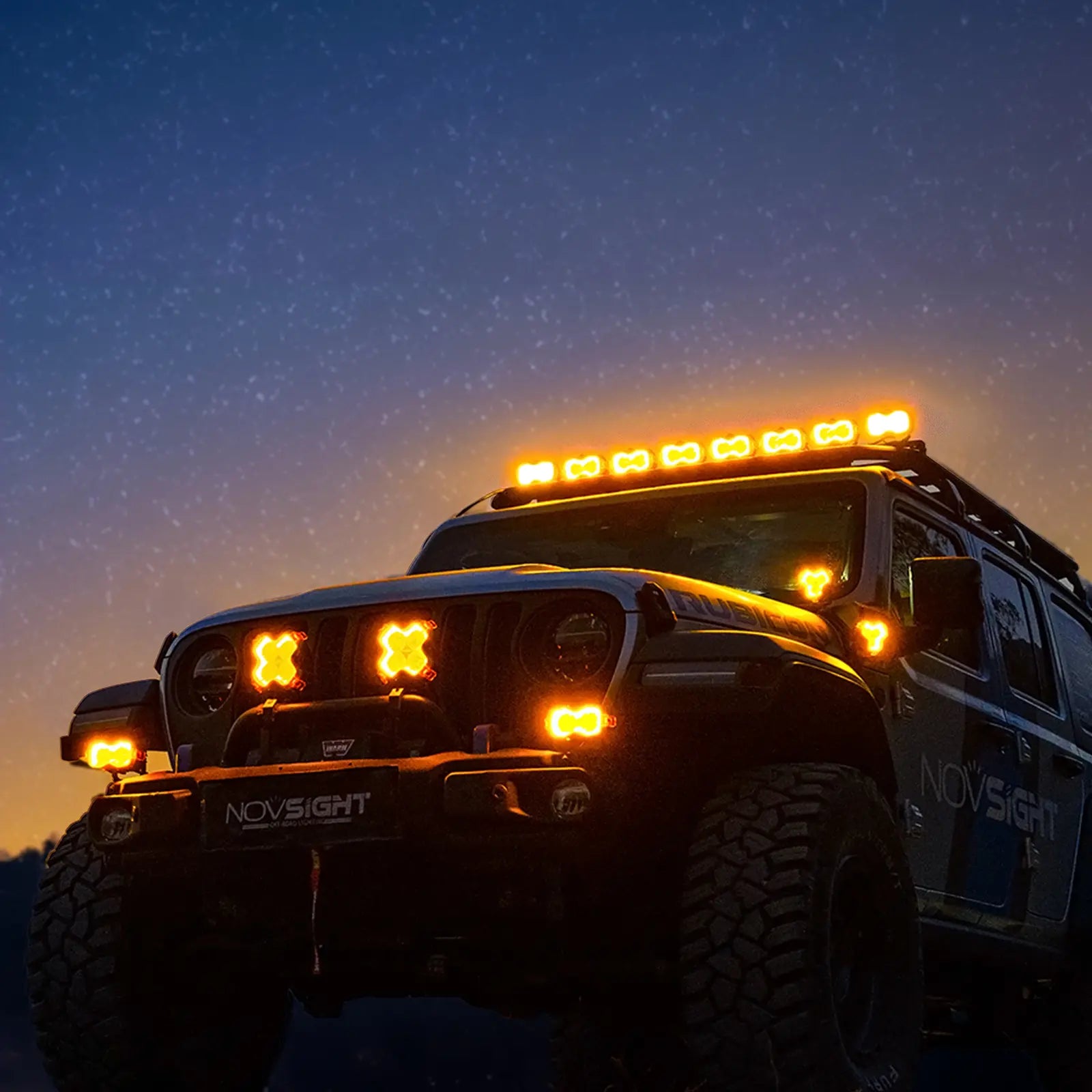 A Wrangler with halo spotlights installed on the roof, front bumper and A-pillar to indicate the status of the daytime running lights.