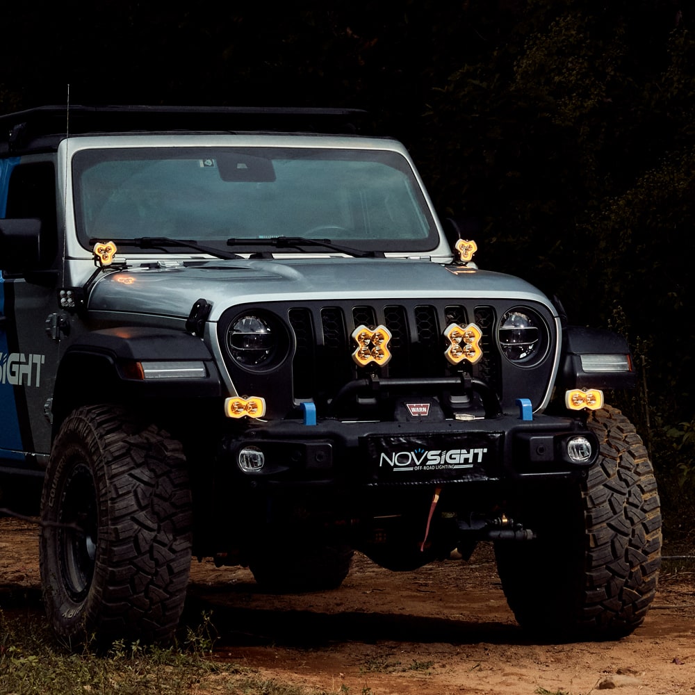 Showing NOVSIGH halo series spotlight mounted on jeep Wrangler